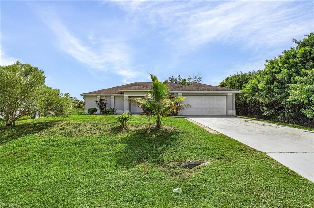 1828 Tomaso AVE LEHIGH ACRES, FL 33972
