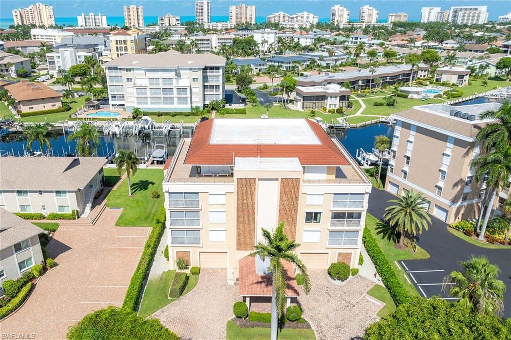 908 Collier CT 302 MARCO ISLAND, FL 34145