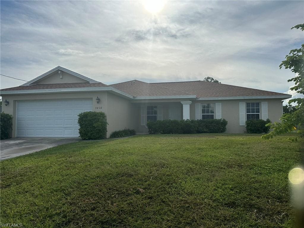 3210 NW Juanita PL CAPE CORAL, FL 33993