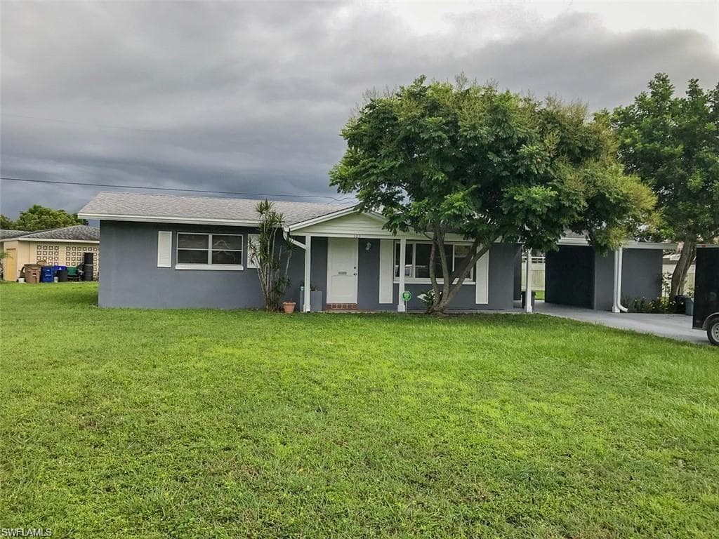 323 Grovewood AVE S LEHIGH ACRES, FL 33936
