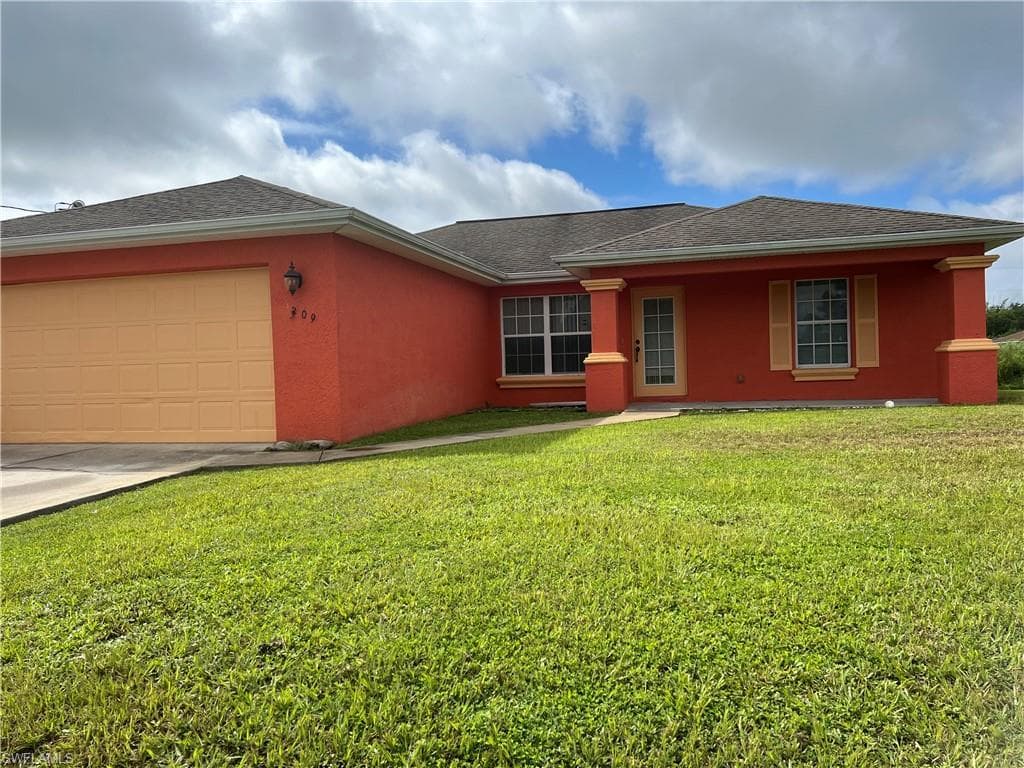 3209 21st ST SW LEHIGH ACRES, FL 33976