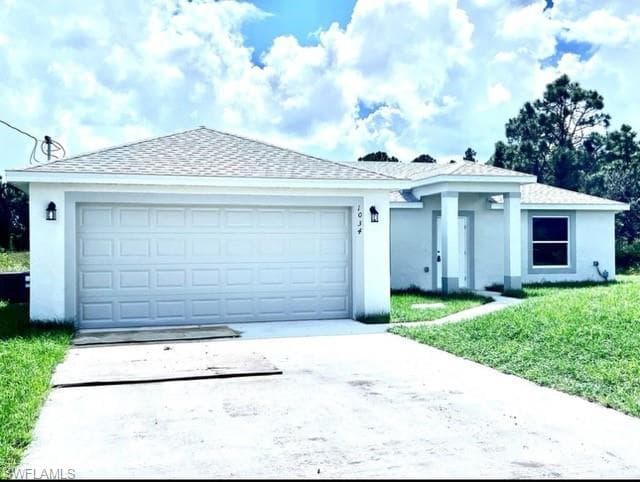 1034 Pilgrim ST E LEHIGH ACRES, FL 33974