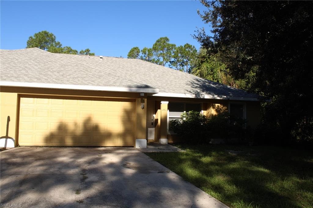 242 Rogers ST LEHIGH ACRES, FL 33972
