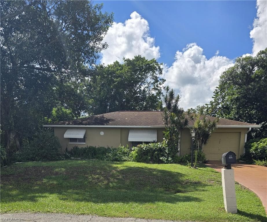 706 JACKSON LN LEHIGH ACRES, FL 33936