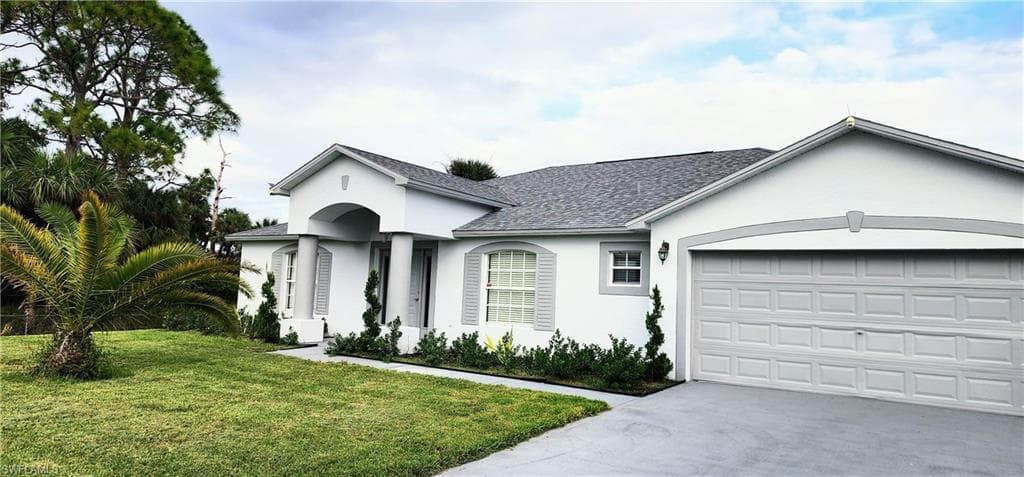 3004 RITA AVE N LEHIGH ACRES, FL 33971