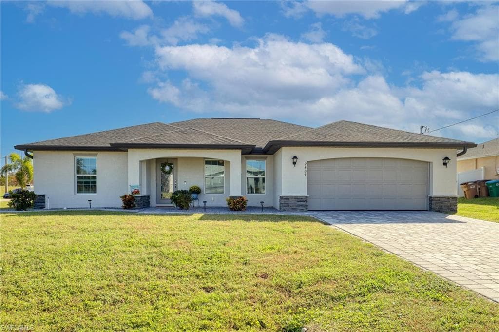 2409 SW 18th AVE CAPE CORAL, FL 33914