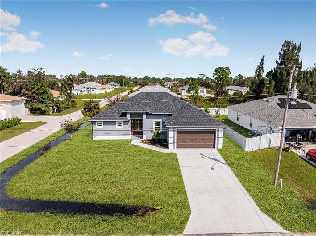 3218 44th ST SW LEHIGH ACRES, FL 33976