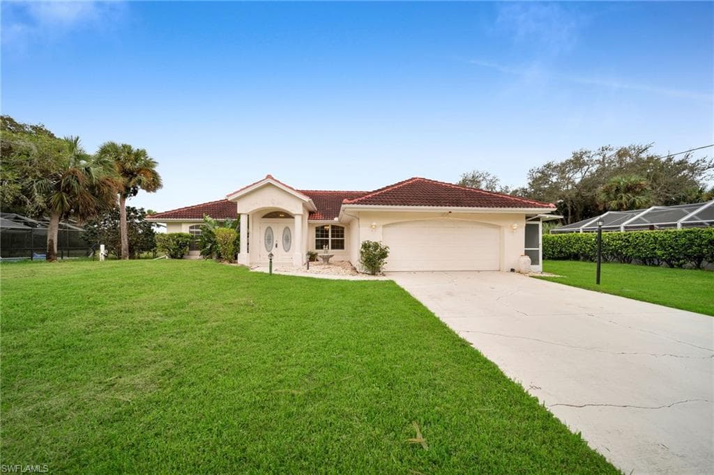 410 Sheldon AVE LEHIGH ACRES, FL 33936
