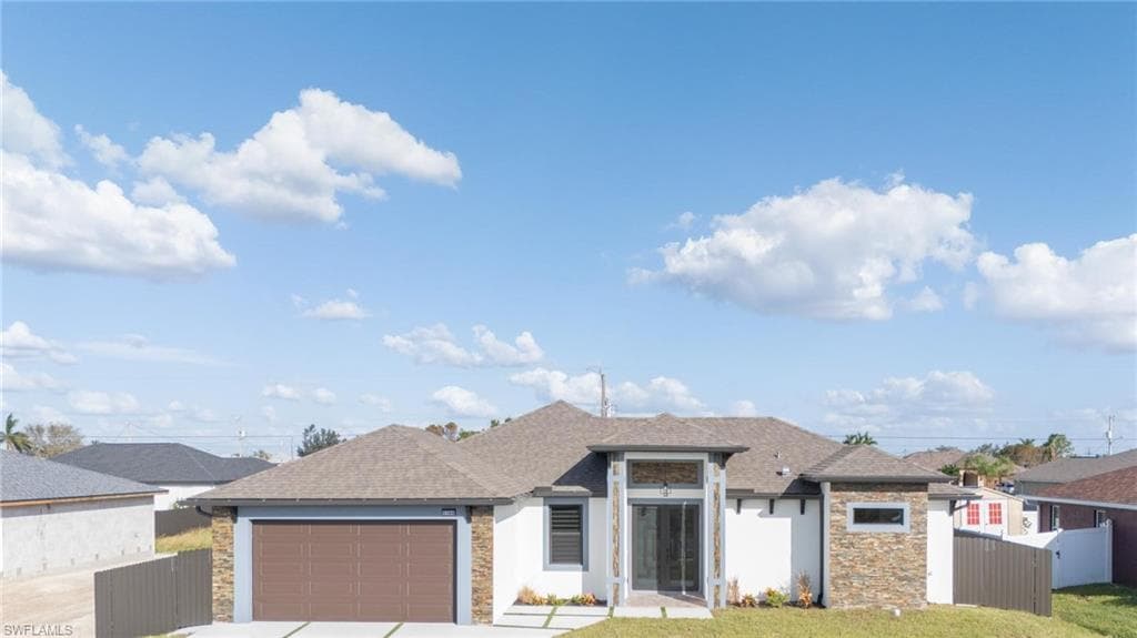 1703 NE 6th AVE CAPE CORAL, FL 33909