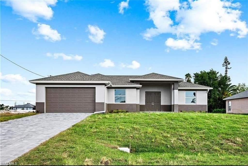 1411 NW 10th AVE CAPE CORAL, FL 33993