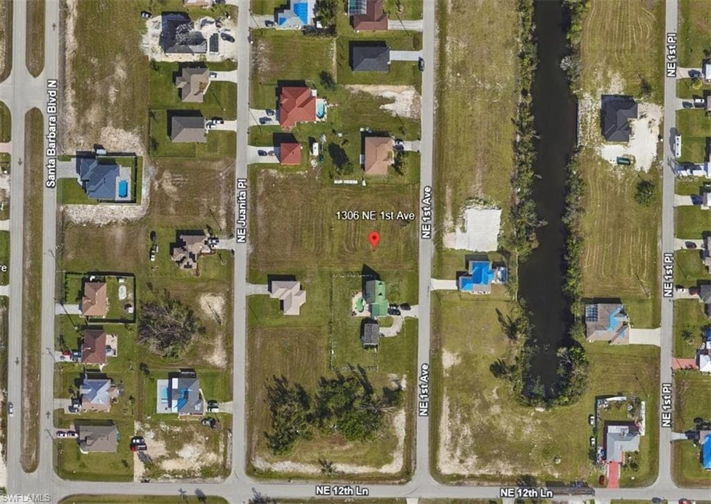 1306 NE 1st AVE CAPE CORAL, FL 33909