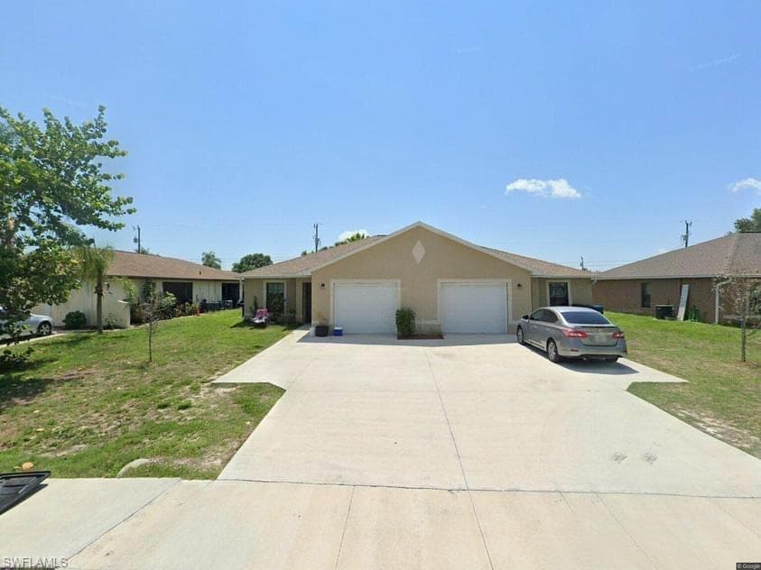 214 SE 24th AVE CAPE CORAL, FL 33990