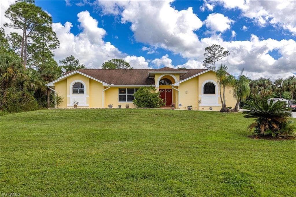 704 Willard AVE LEHIGH ACRES, FL 33972