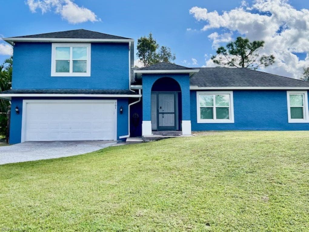 701 John AVE S LEHIGH ACRES, FL 33973