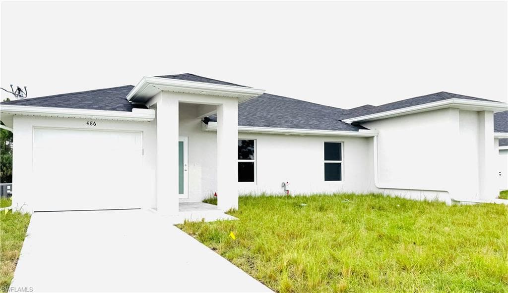 484/486 Lotus AVE S LEHIGH ACRES, FL 33974
