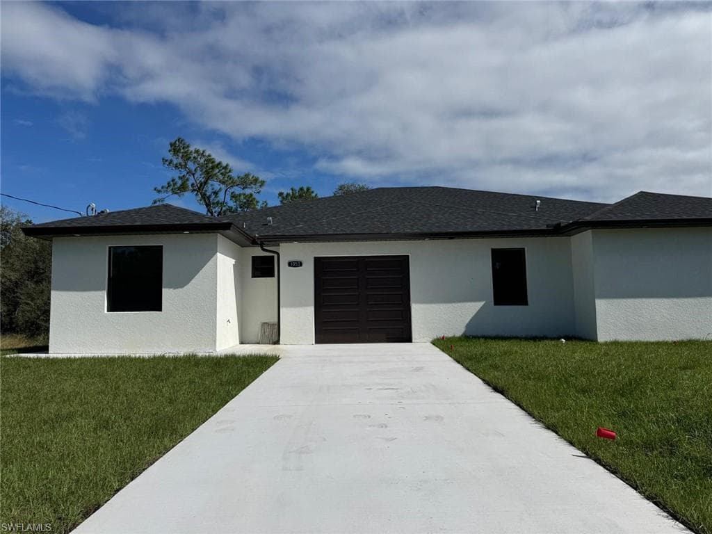 1055/ 1053 Meadow RD LEHIGH ACRES, FL 33973