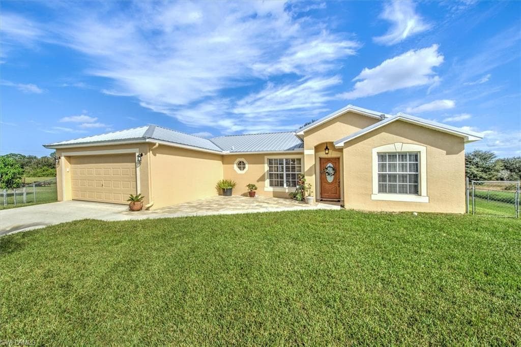 1716 Columbus AVE LEHIGH ACRES, FL 33972