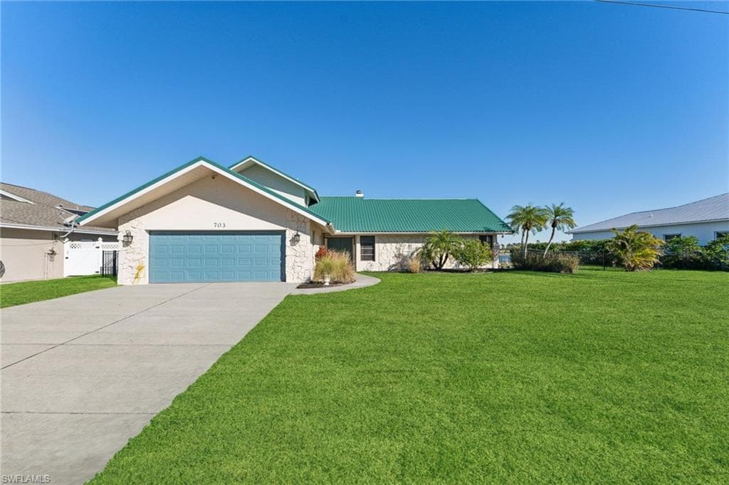 703 SW 53rd TER CAPE CORAL, FL 33914