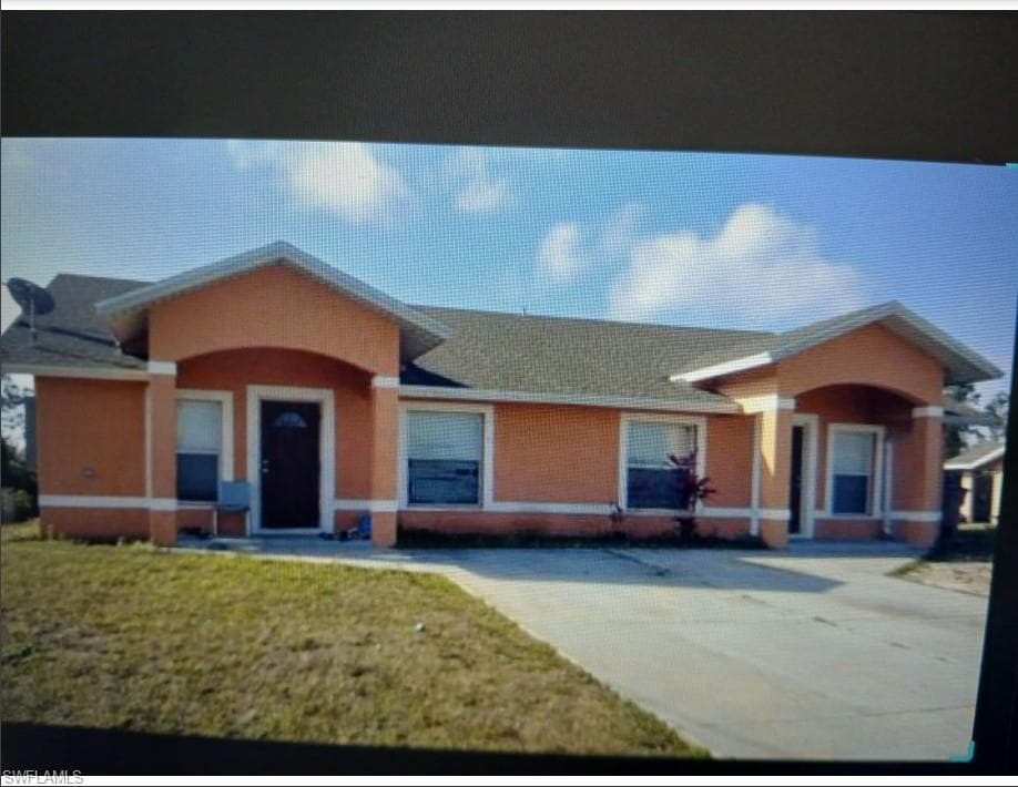 4409/4411 14th ST SW LEHIGH ACRES, FL 33973