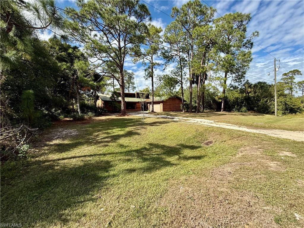 717 Maple AVE N LEHIGH ACRES, FL 33972