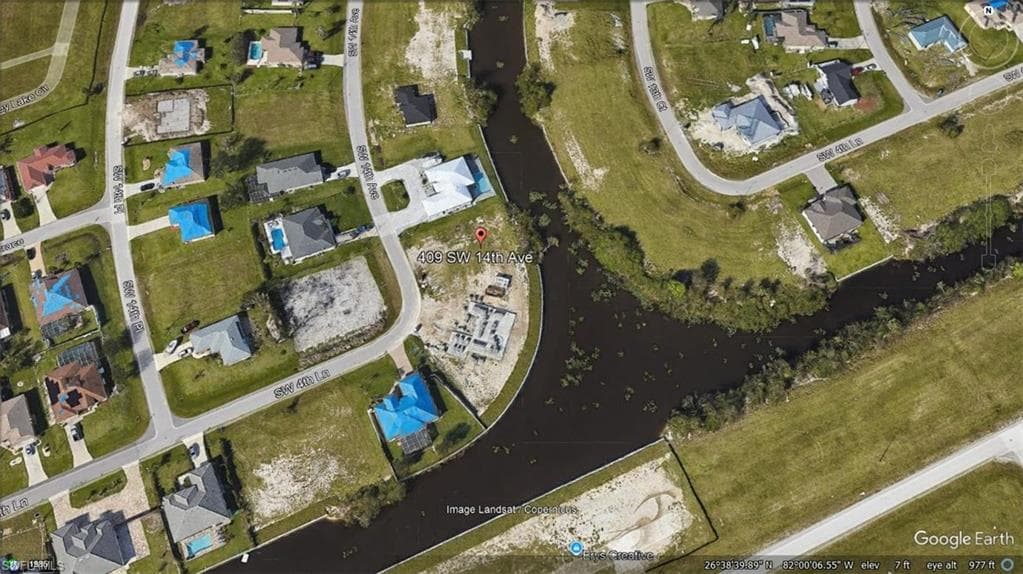 409 SW 14th AVE CAPE CORAL, FL 33991