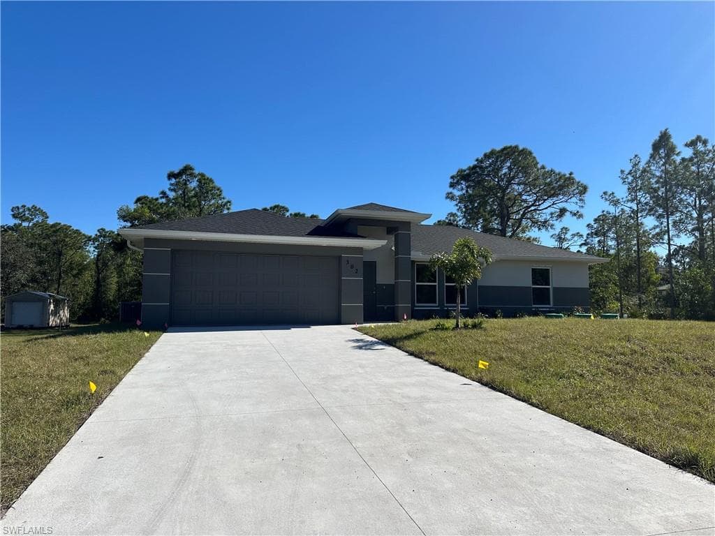 302 Johns AVE LEHIGH ACRES, FL 33936