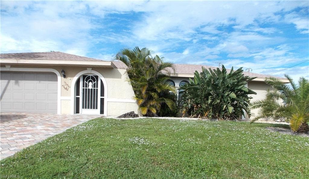 911 SE 34th TER CAPE CORAL, FL 33904