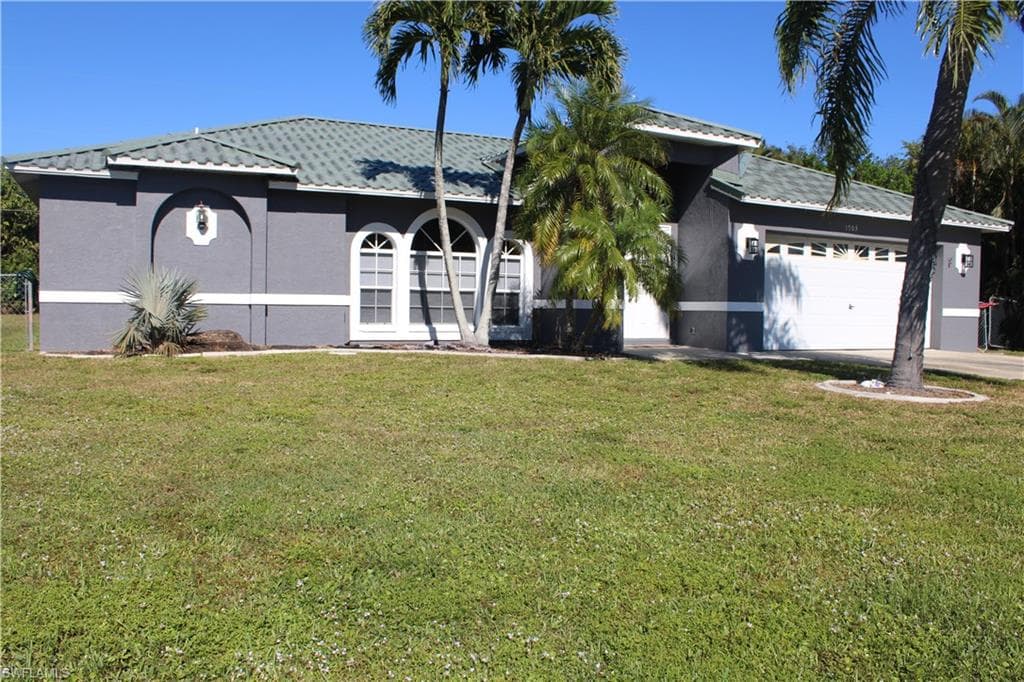 1703 SE 8th ST CAPE CORAL, FL 33990