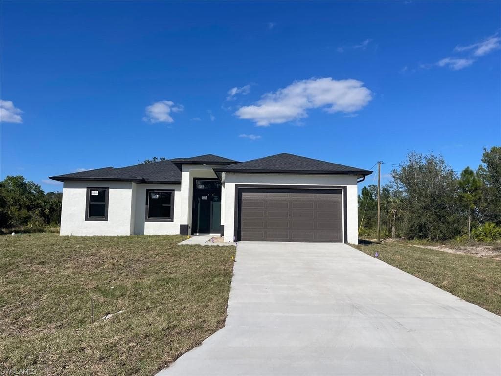 302 W 8th ST LEHIGH ACRES, FL 33972