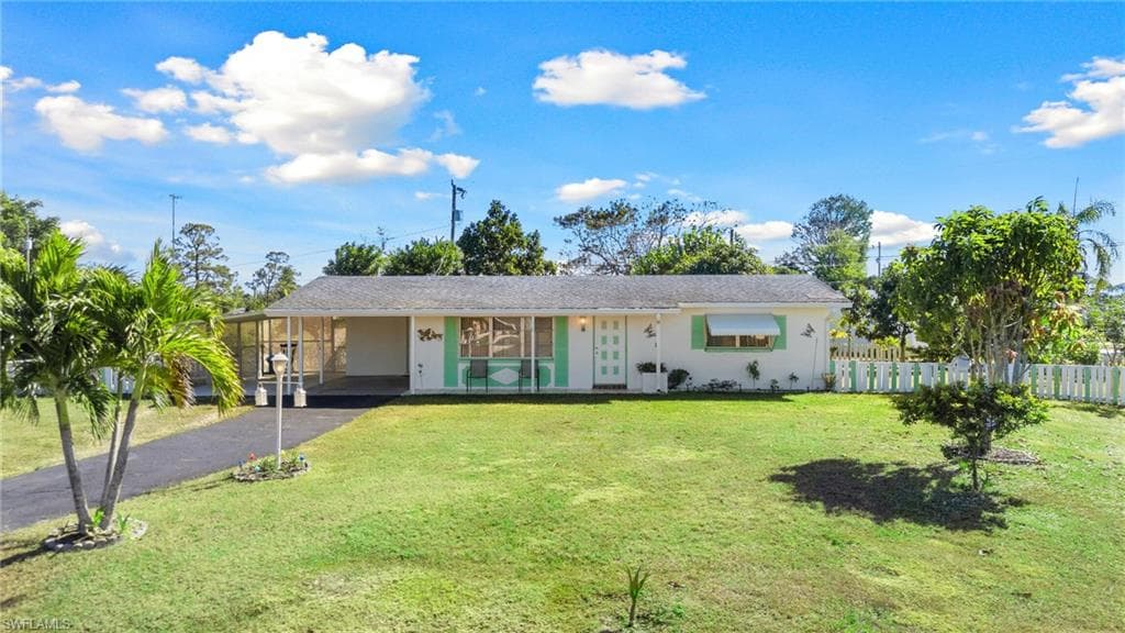 110 W Jasmine RD LEHIGH ACRES, FL 33936