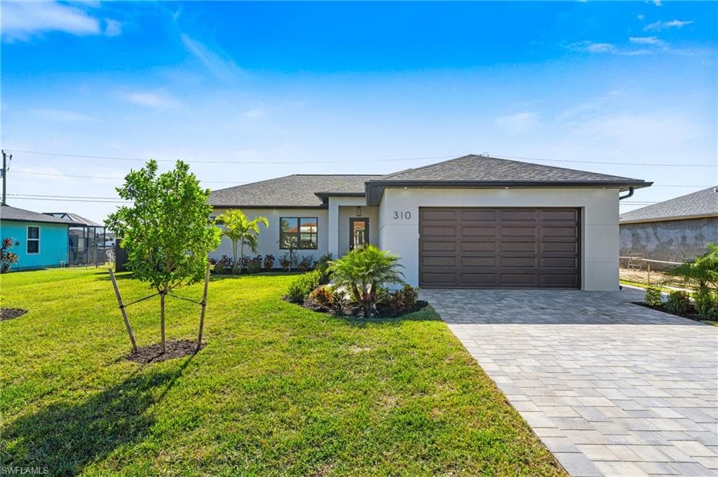 310 NE 8th TER CAPE CORAL, FL 33909