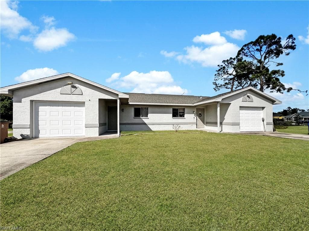2704 Owen AVE 2704 LEHIGH ACRES, FL 33973