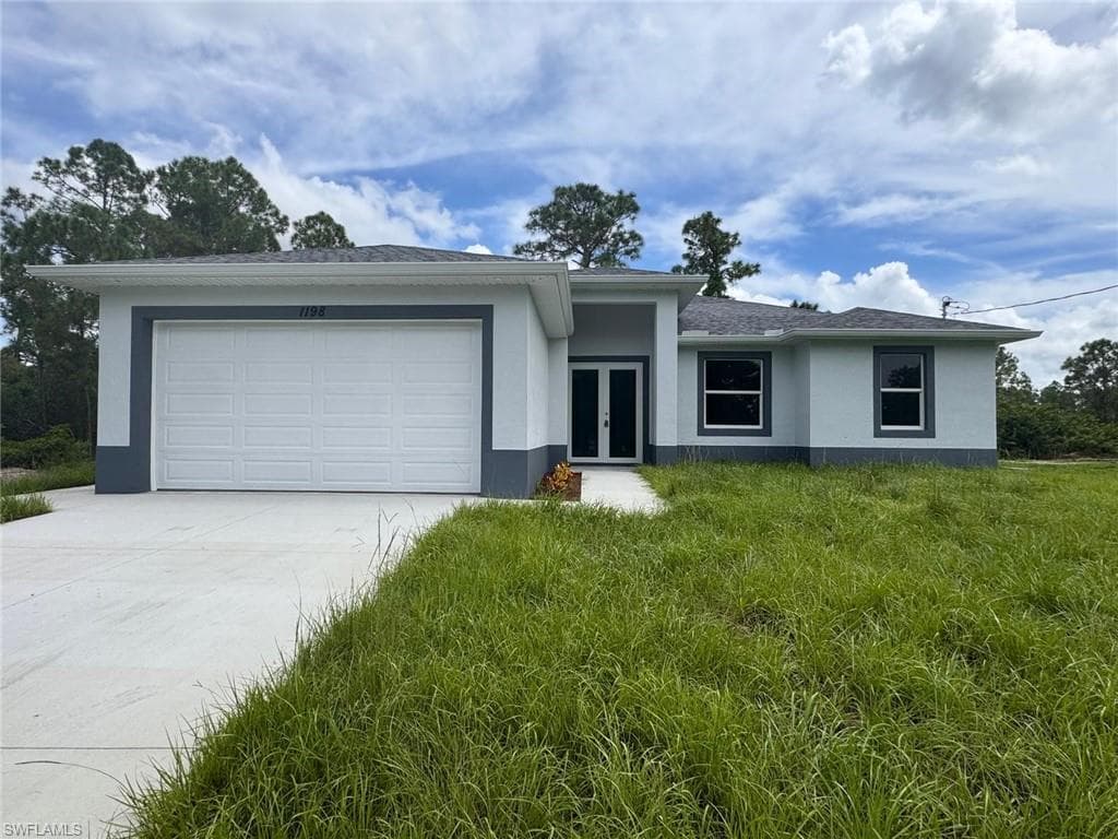 1410 POINSETTIA AVE LEHIGH ACRES, FL 33972