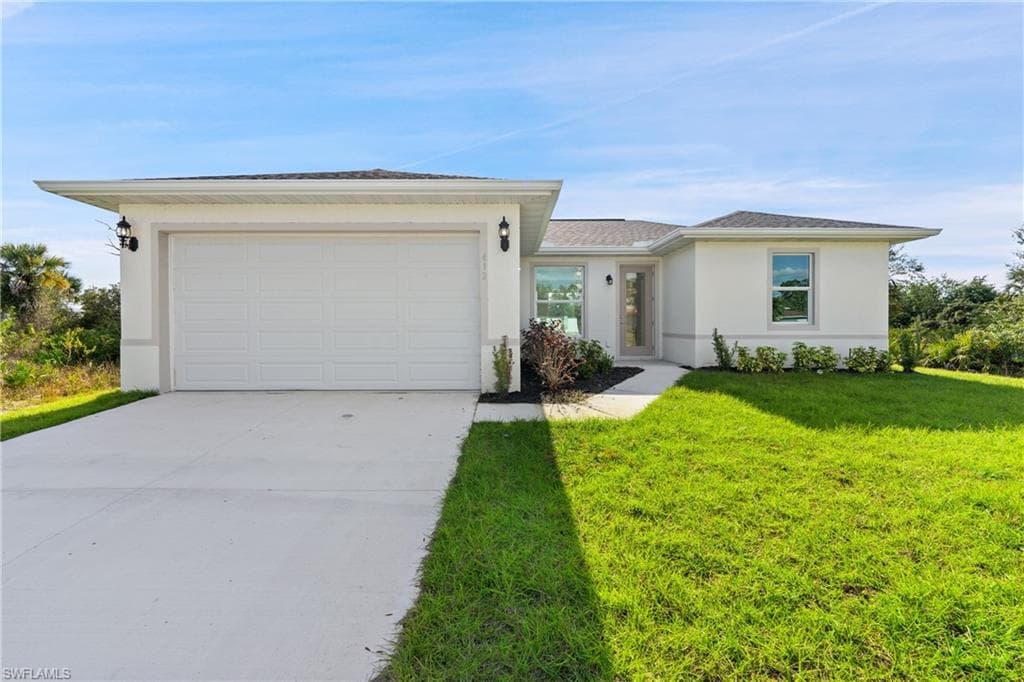 412 Wickham AVE S LEHIGH ACRES, FL 33974