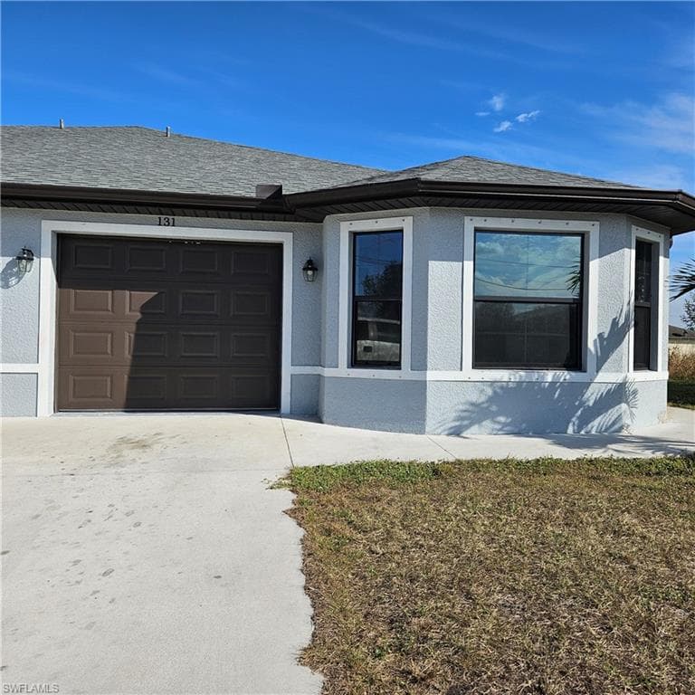 131 Gilbert AVE S LEHIGH ACRES, FL 33973