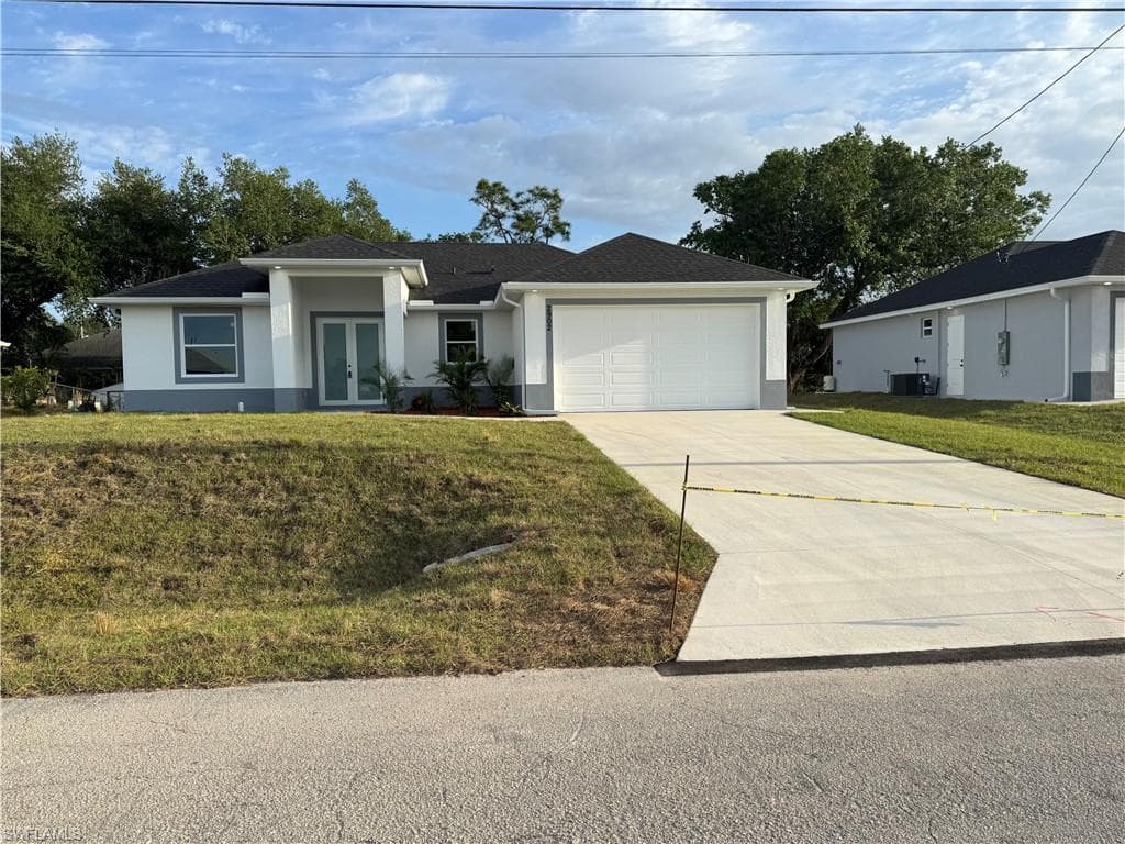 2902 49TH ST SW LEHIGH ACRES, FL 33976