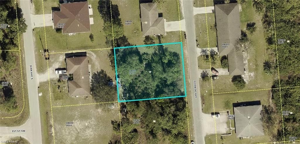 104/106 ICHABOD AVE LEHIGH ACRES, FL 33973