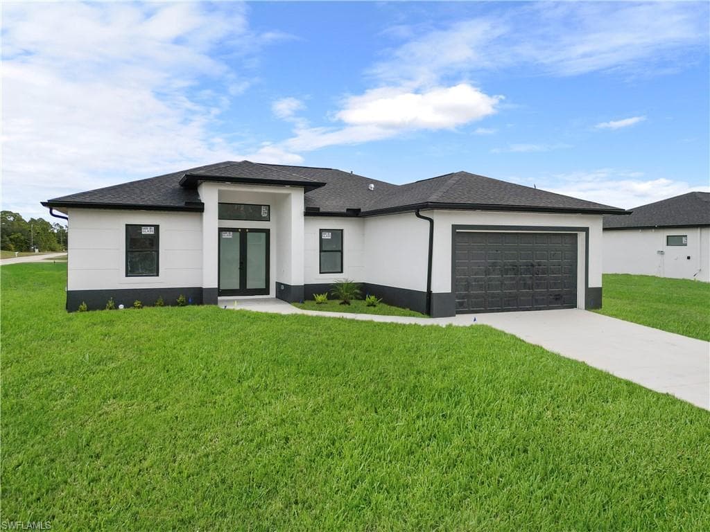 3314 8TH ST W LEHIGH ACRES, FL 33971