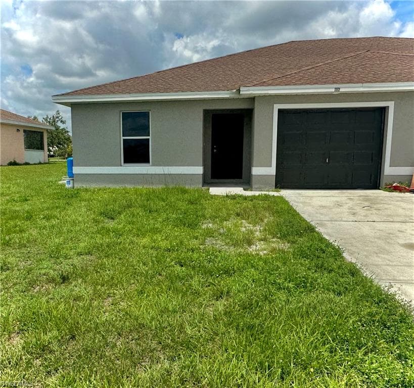 406 Petite AVE LEHIGH ACRES, FL 33974