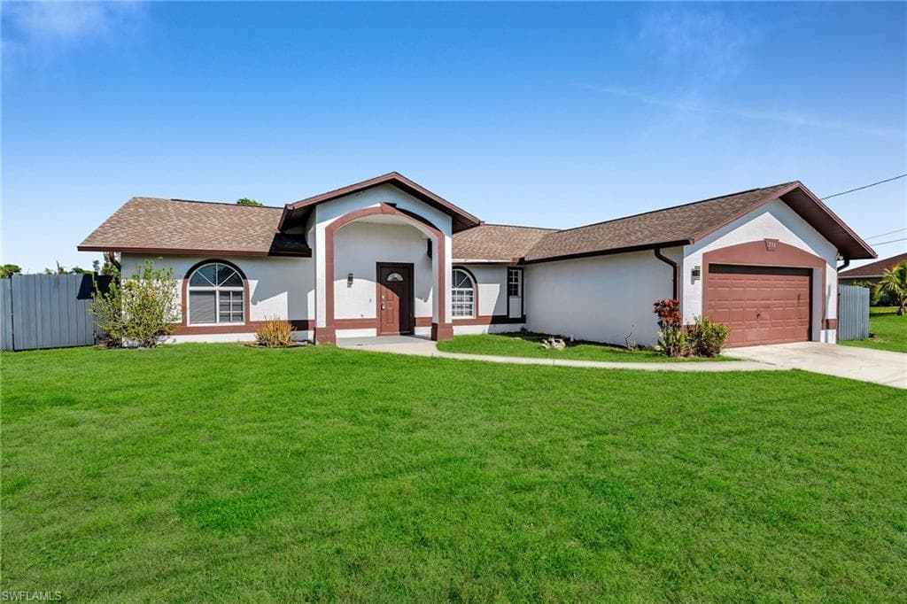 215 NW 15th TER CAPE CORAL, FL 33993
