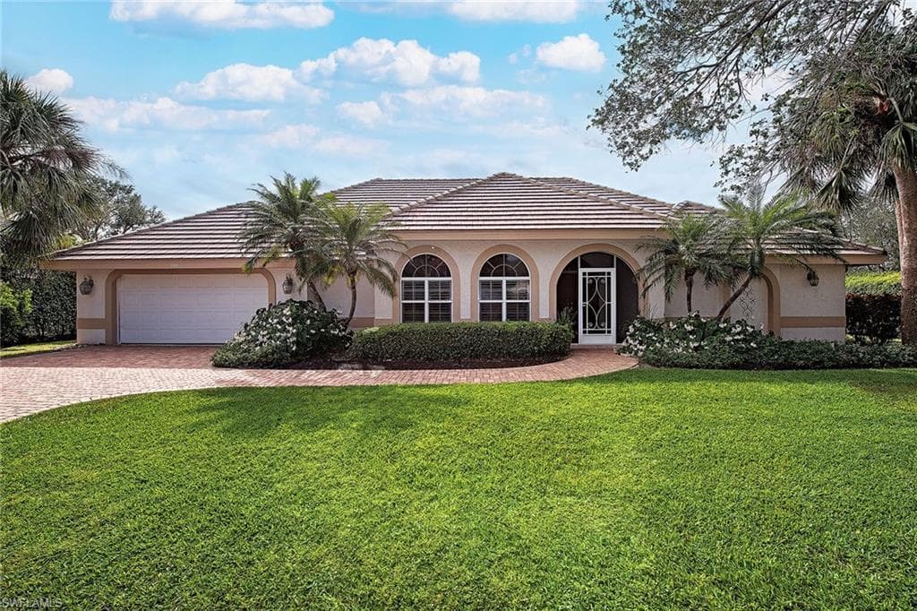 702 Willowwood LN NAPLES, FL 34108