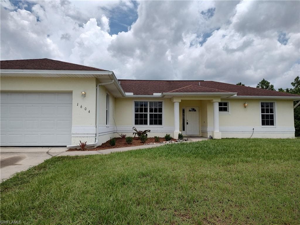 1604 W 11th ST LEHIGH ACRES, FL 33972
