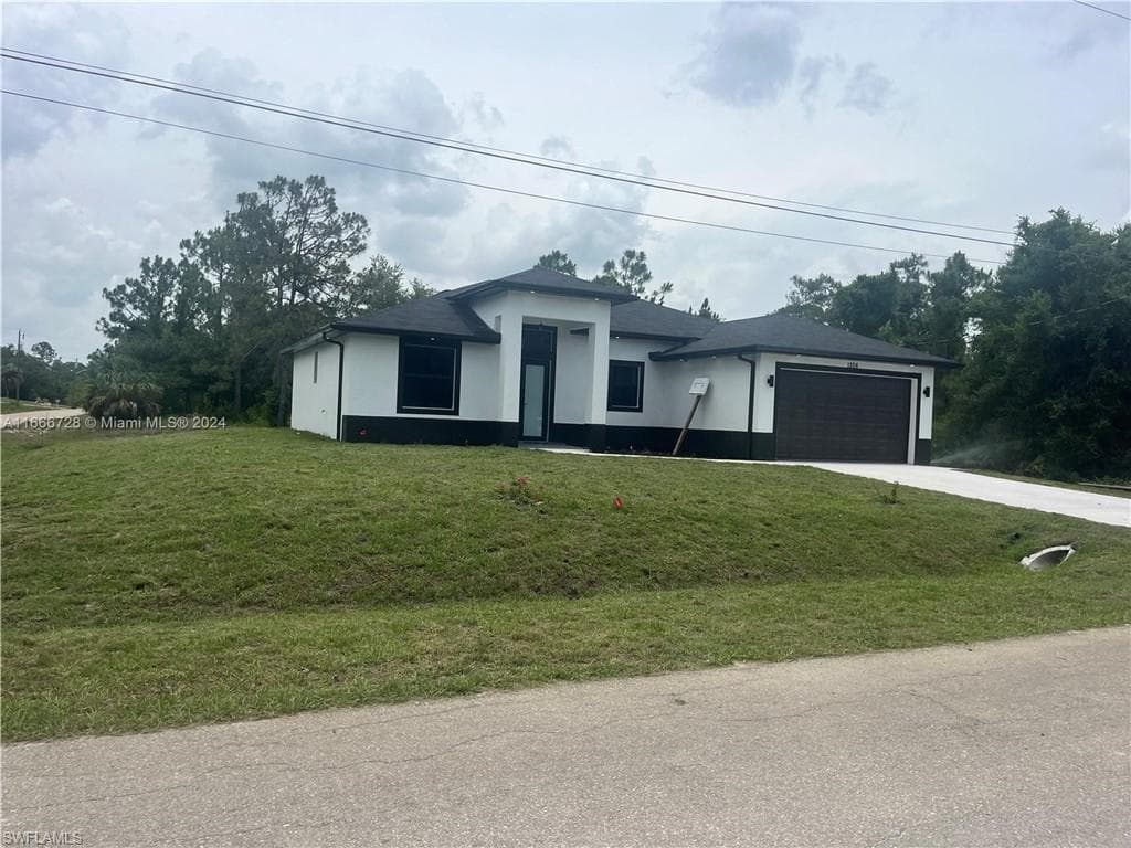 1306 W 15th ST LEHIGH ACRES, FL 33972