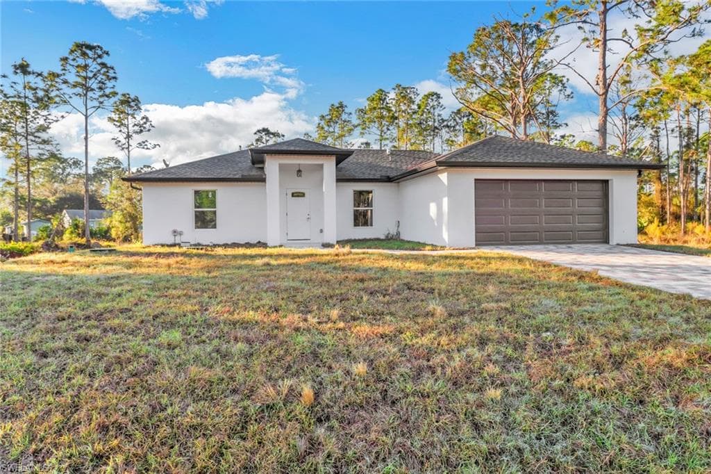 906 Milwaukee BLVD LEHIGH ACRES, FL 33974
