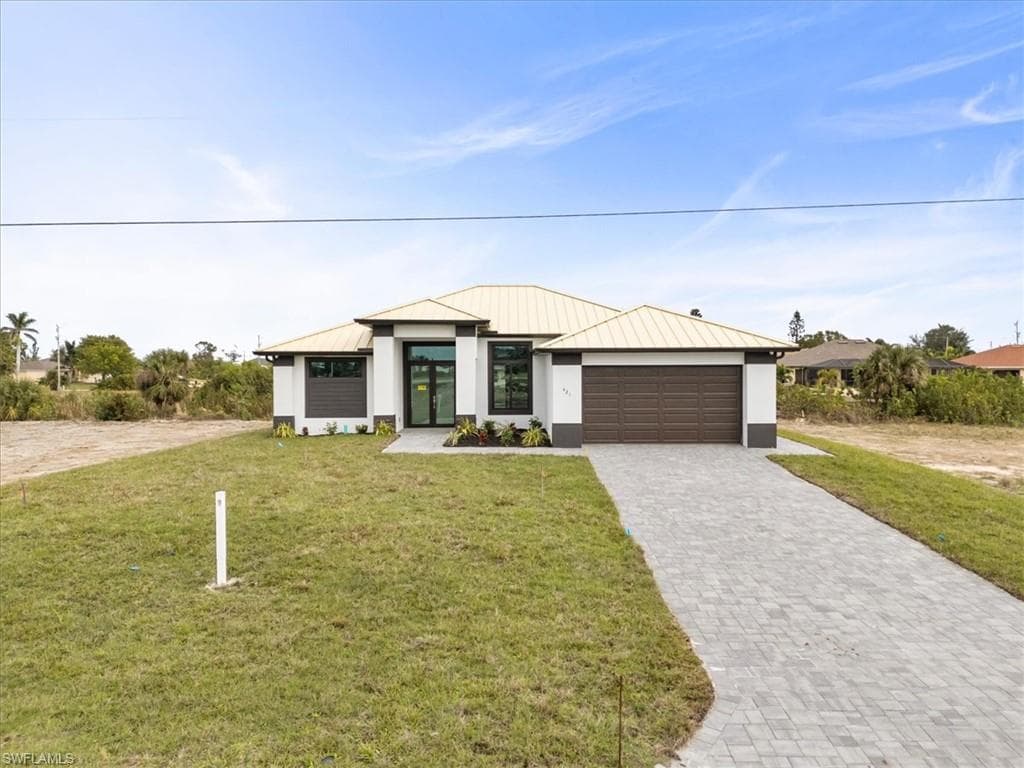 421 NW 31st PL CAPE CORAL, FL 33993
