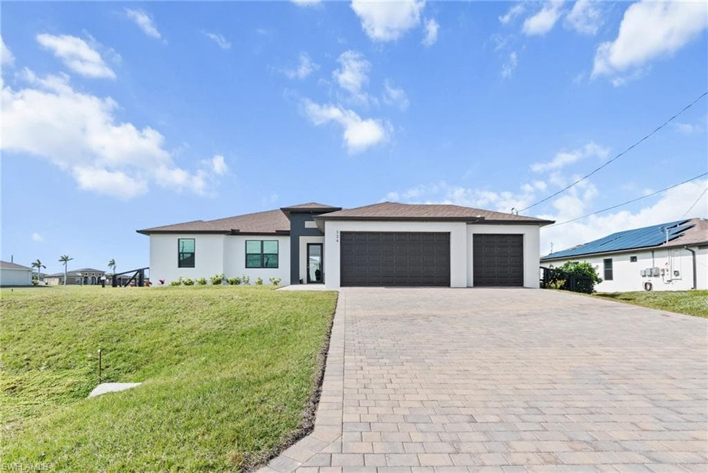 124 NW 24th PL CAPE CORAL, FL 33993