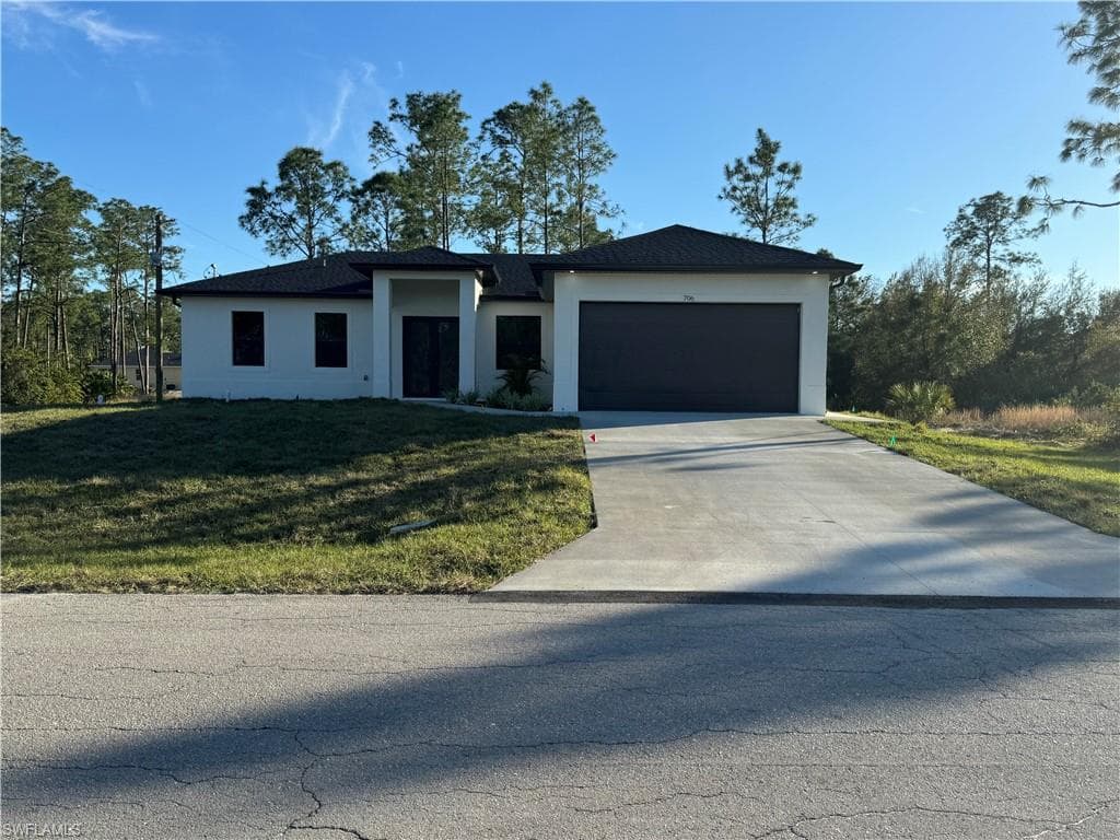 706 E 13th ST LEHIGH ACRES, FL 33972