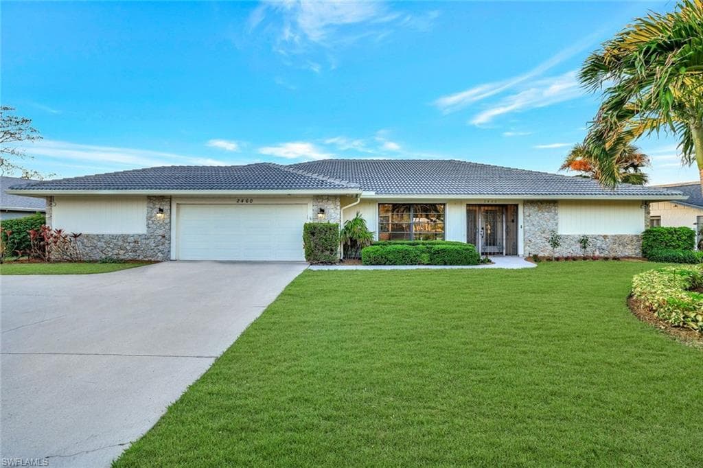 2460 Kings Lake BLVD NAPLES, FL 34112