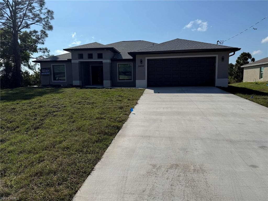 3409 26th ST SW LEHIGH ACRES, FL 33976