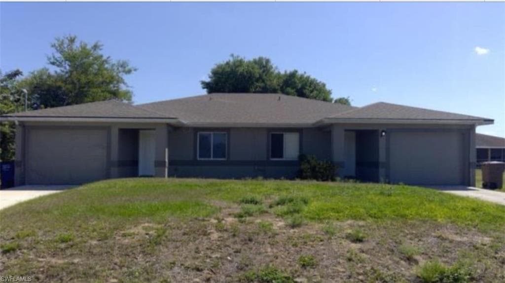 725/727 Ivan AVE S LEHIGH ACRES, FL 33973